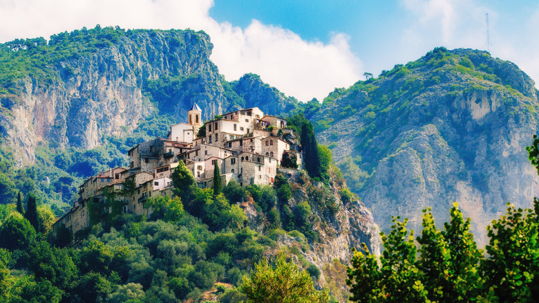 Houses crown the hilltop village of Peillon