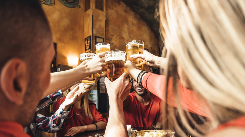 Group of friends drinking beer at a brewery