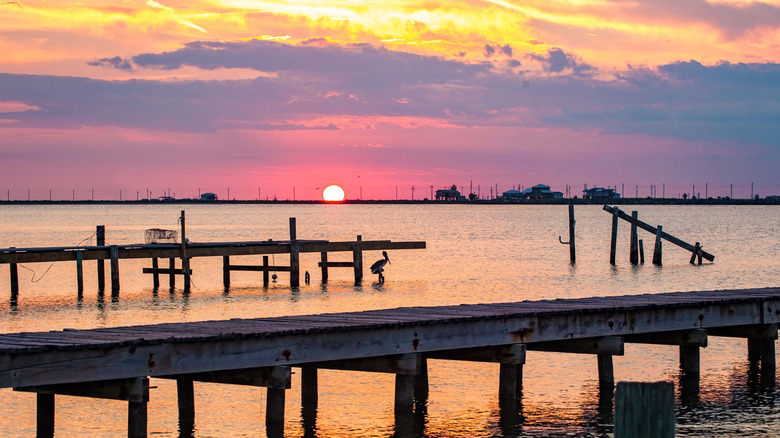 Sunset over a wooden pier in Louisiana