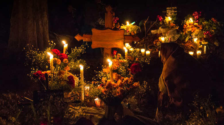 Cemetery candlelit vigil on Day of the Dead