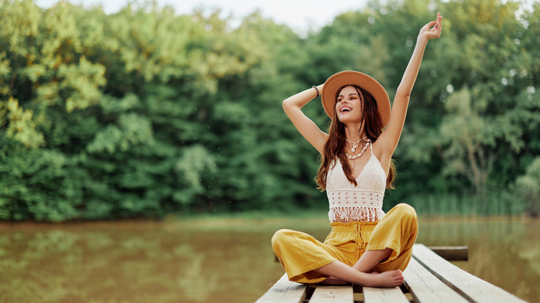 Woman relaxing on a dock