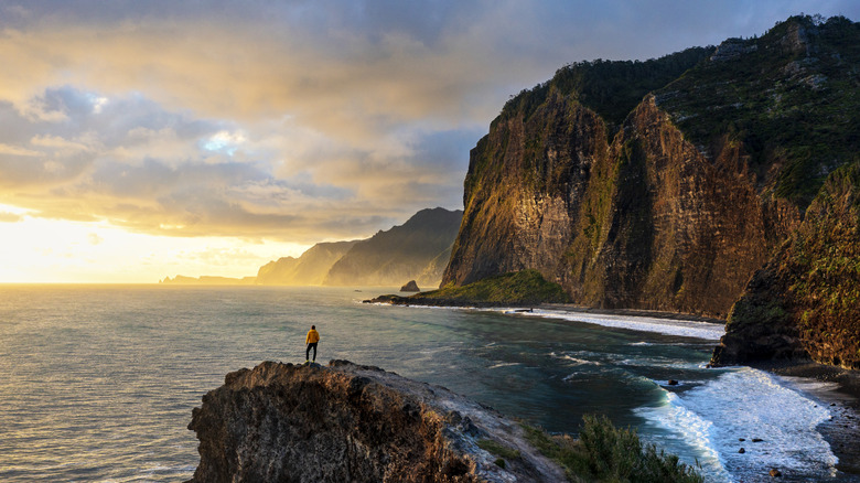 Hiker on the coast of Madeira, Portugal