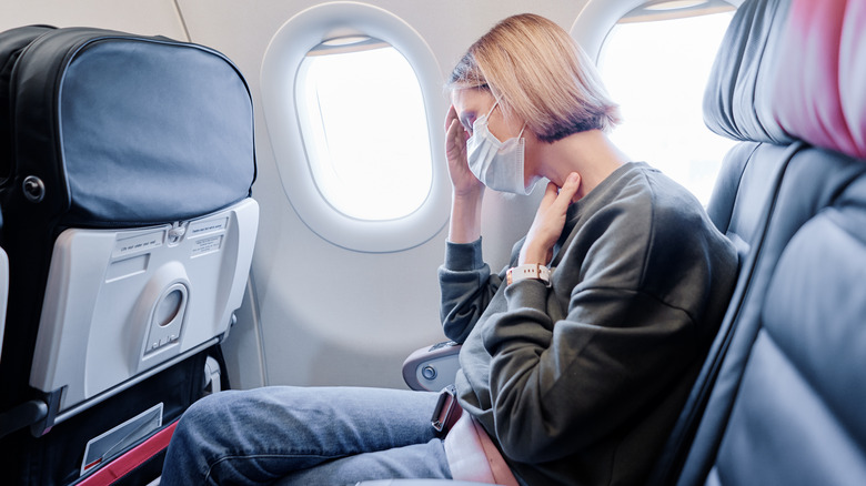 Woman experiencing flight anxiety