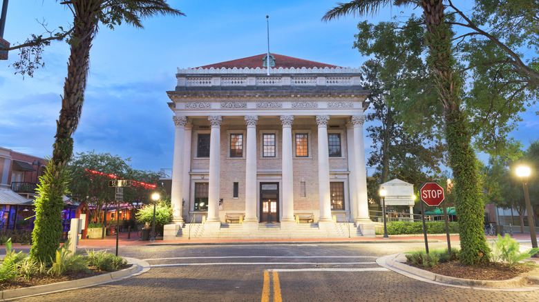 Hippodrome theater columns vistaed by trees