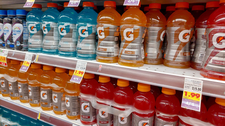 Multi-colored Gatorade drink bottles store shelf