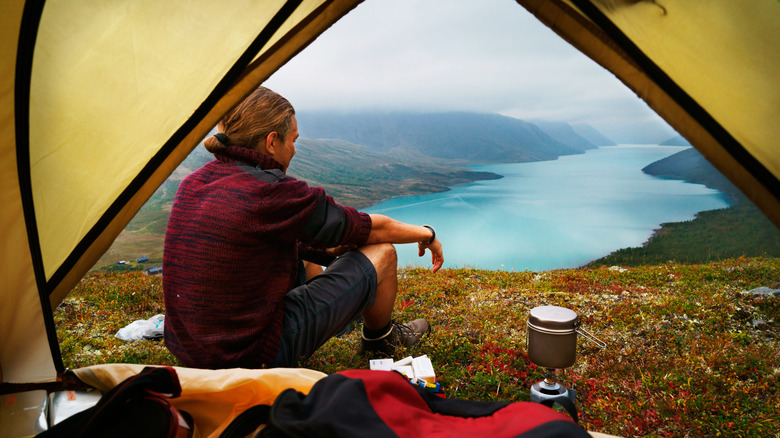 camper admiring lake view