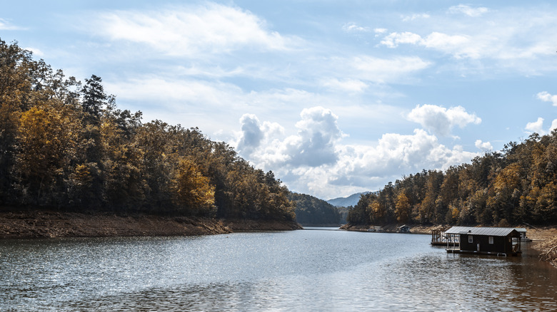 Scenic view of a boathouse on a river