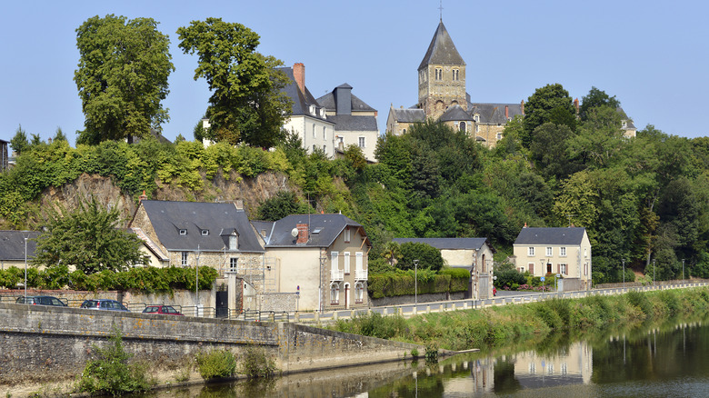 church and houses by river