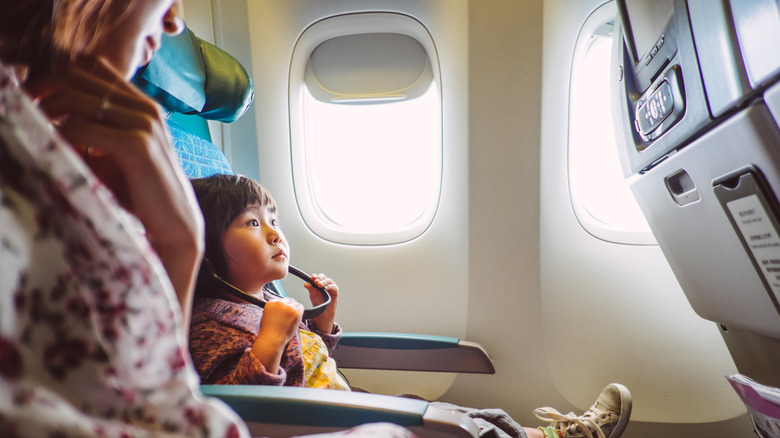 Woman and child on plane