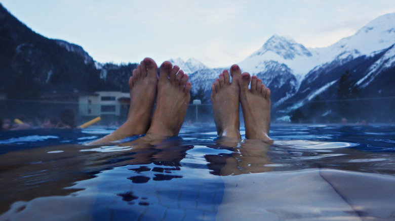 Feet peak out of water in Aqua Dome, Austria