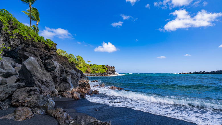 The black sands of Wai'ānapanapa State Park beach in Maui, Hawaii