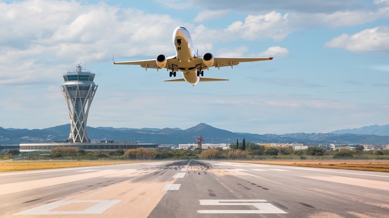 airplane landing on tarmac