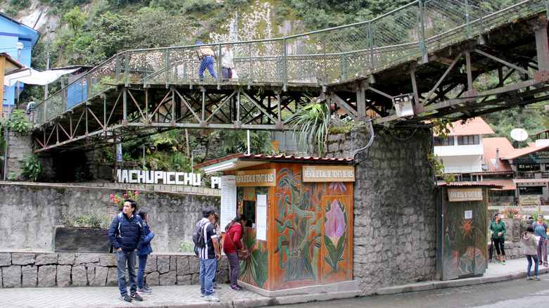 A bus station and ticket booth at Aguas Calientes, Peru.