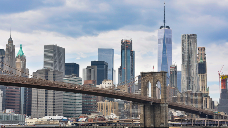 Brooklyn Bridge surrounded by skyscrapers