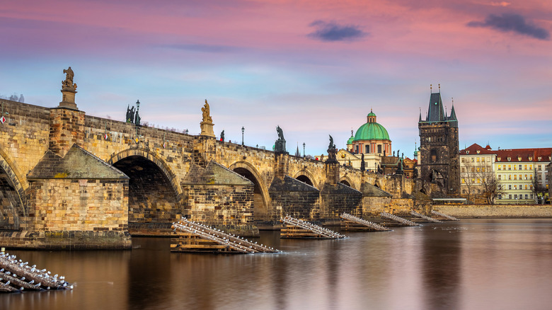 Charles Bridge below pink sky