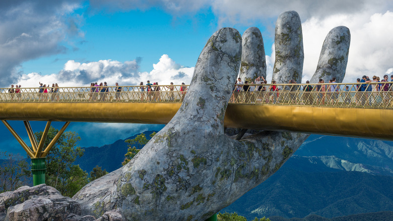 stone hand beneath Golden Bridge