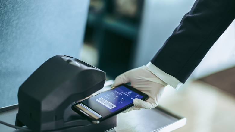 Scanning boarding pass at gate