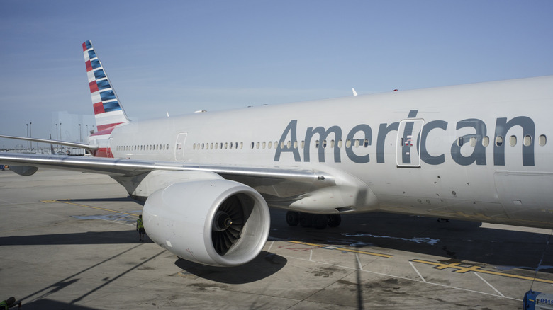 closeup of side of American Airlines plane on tarmac