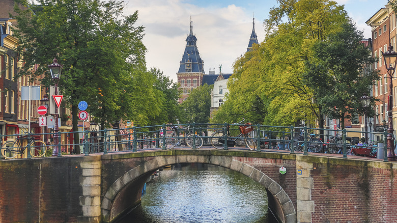 Canal bridge with Rijksmuseum in the background