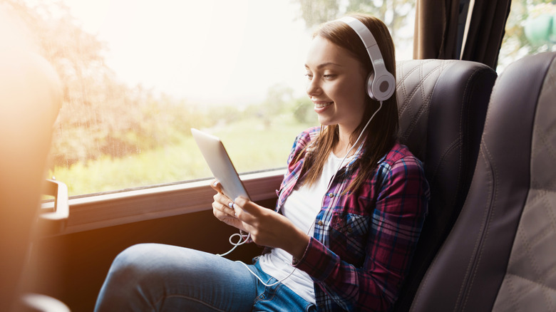 Passenger sitting comfortably on bus