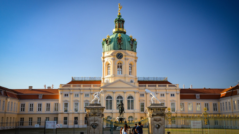 Charlottenburg Palace family standing in front of the gate