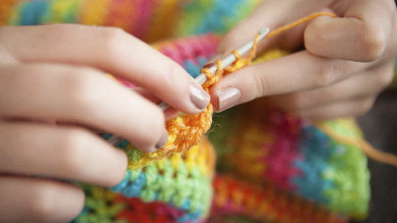 Close-up of hands crocheting