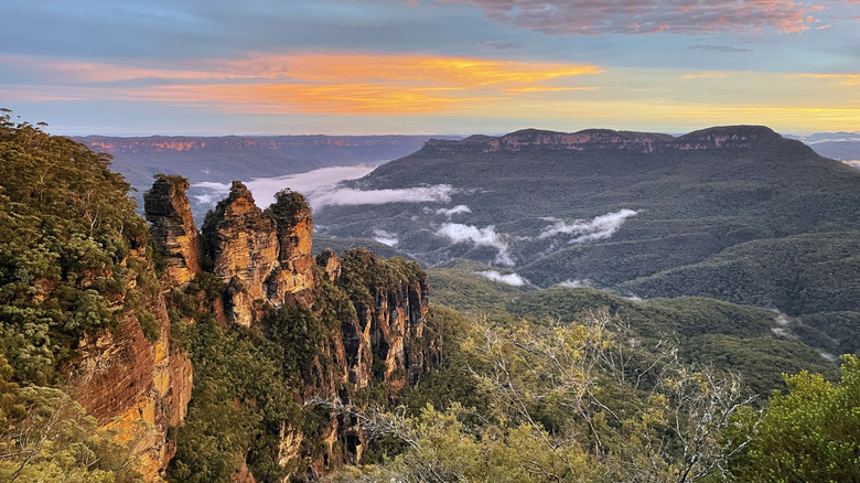 rock formation with three peaks