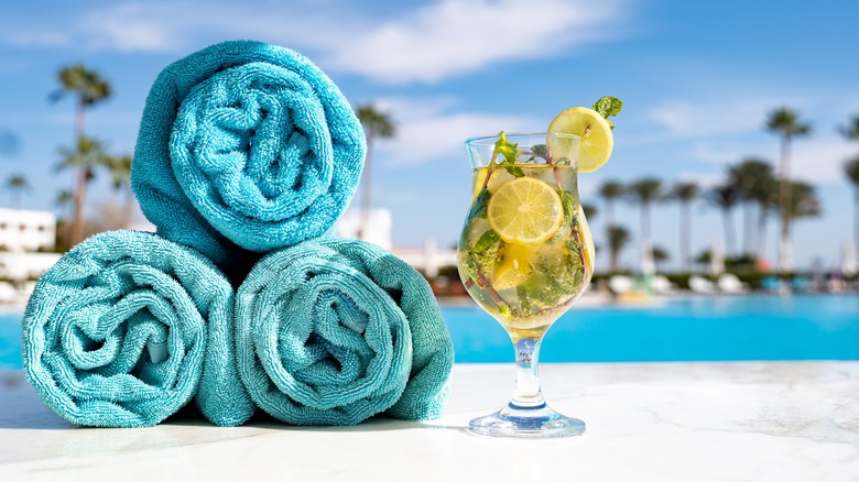 All-inclusive resort towels and drink