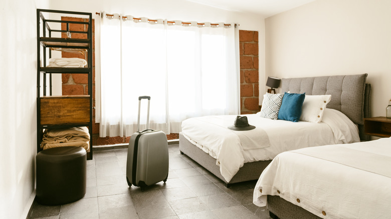 Suitcases in a hotel room