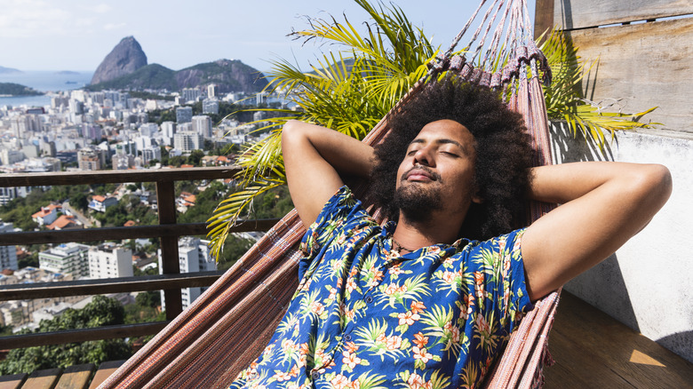 Man resting in hammock