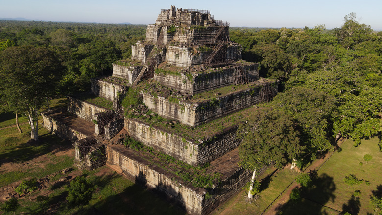 The Koh Ker Pyramid rises over the forest