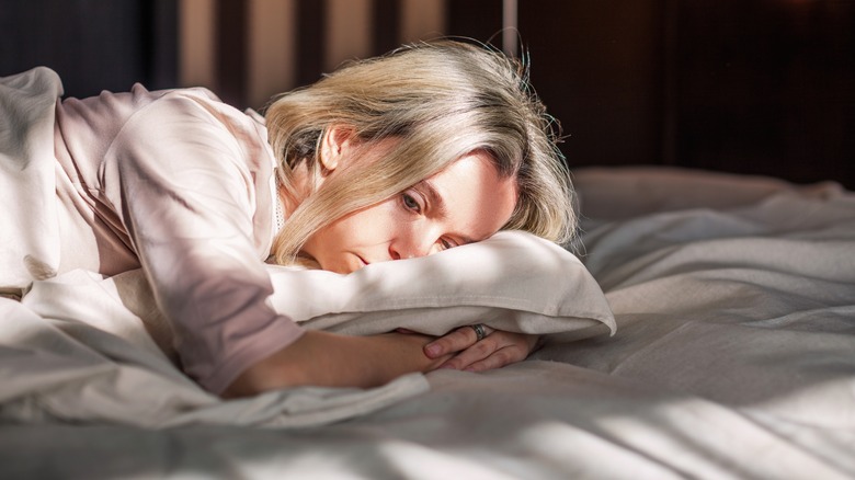 woman staying in bed