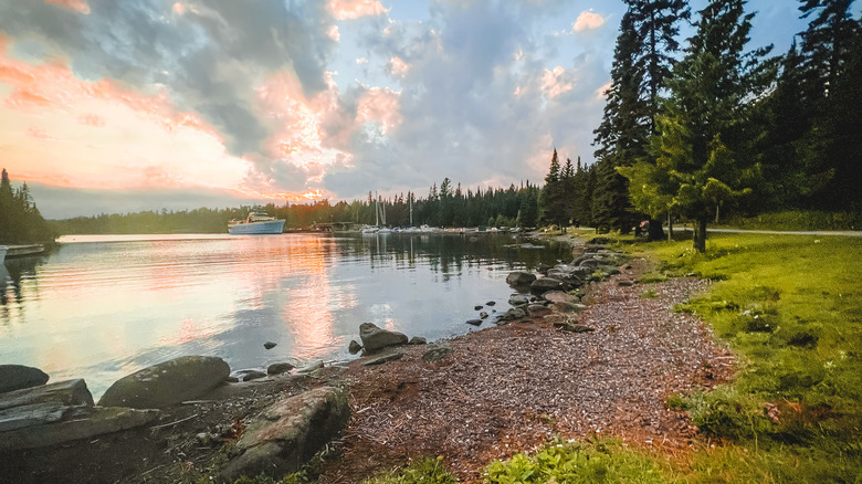 shoreline by calm lake