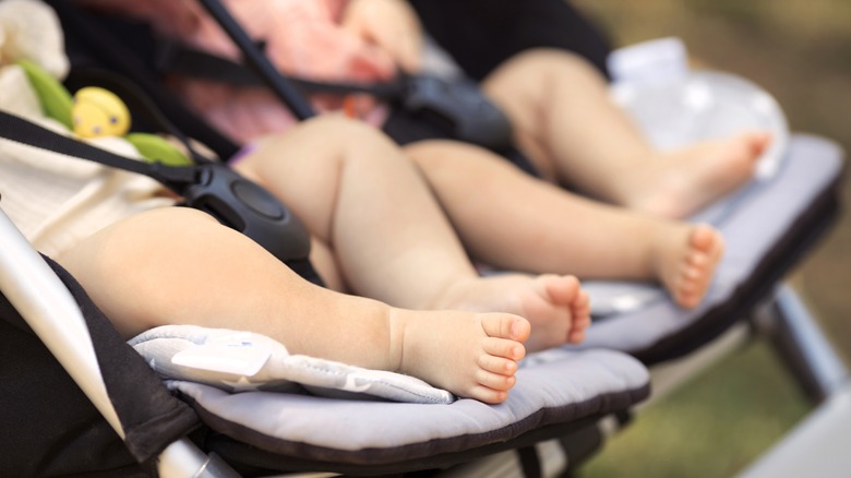 baby feet resting on stroller