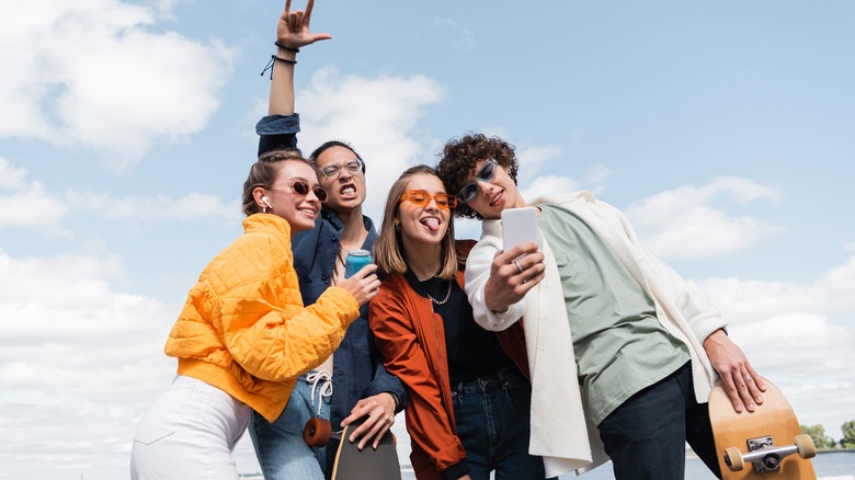 A group of youths pose for a selfie