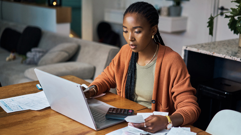 stressed woman budgeting