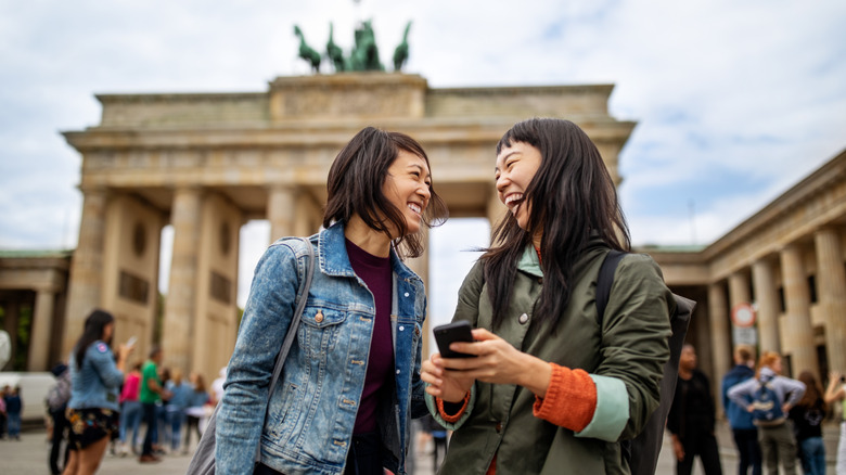 Two friends laughing together