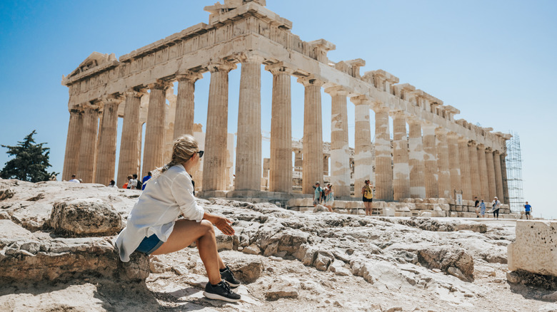 Woman looking at the Parthenon