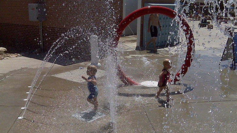 children playing at splashpad area