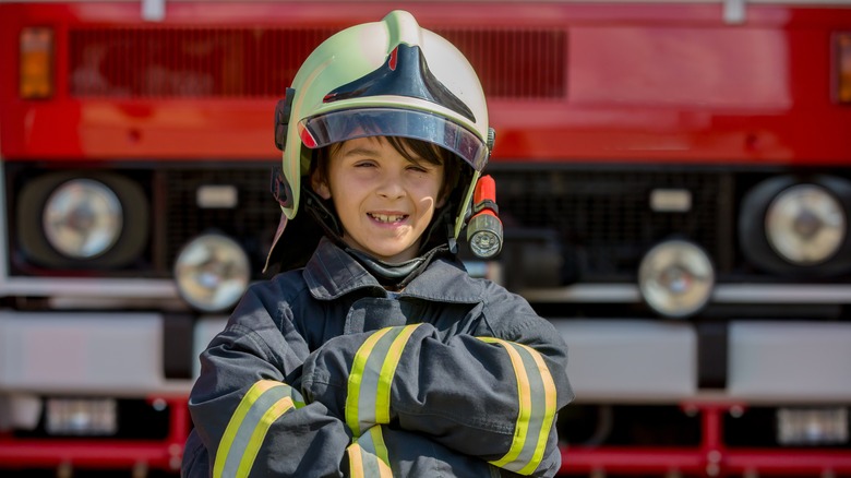 kid dressed as a fireman