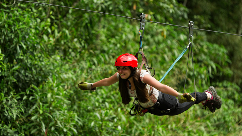 Person Superman ziplining