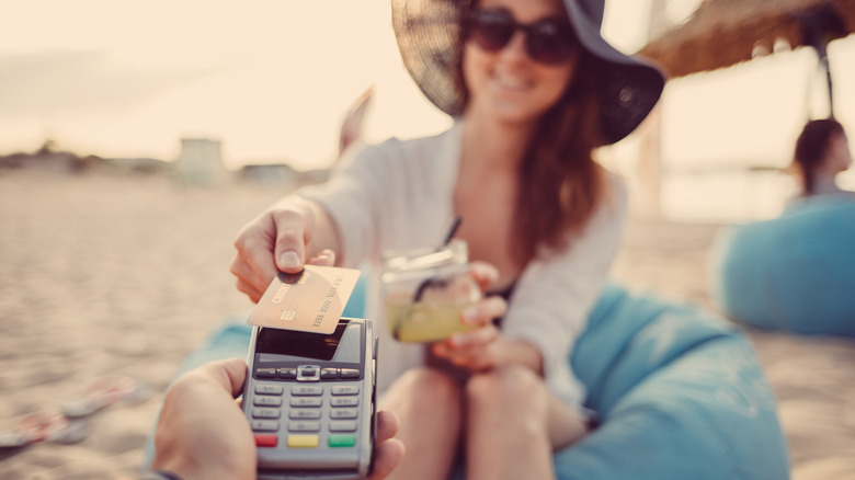 Woman buying drinks