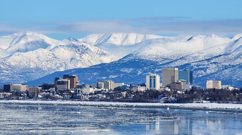 city against mountains winter