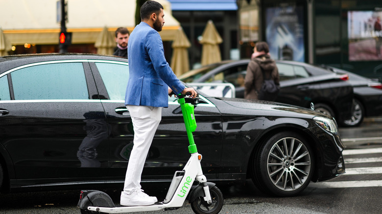 Person riding an e-scooter