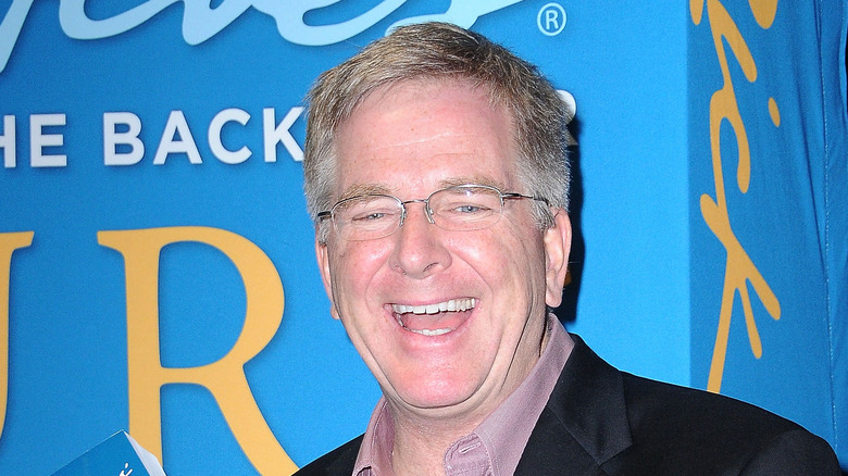 Rick Steves at an event for his tour company