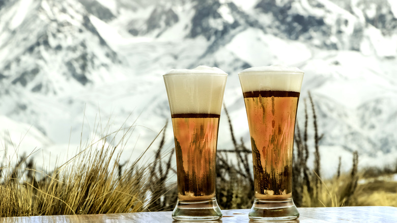 Beer in front of mountains