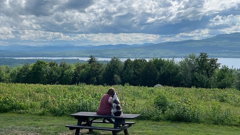 Camper with dog at Mount Blue State Park