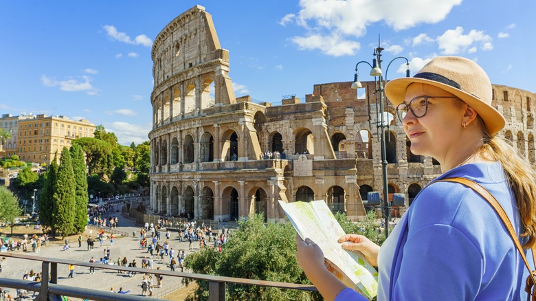 tourist outside Colosseum in Rome