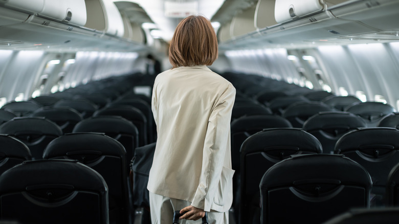 Traveler boarding empty plane