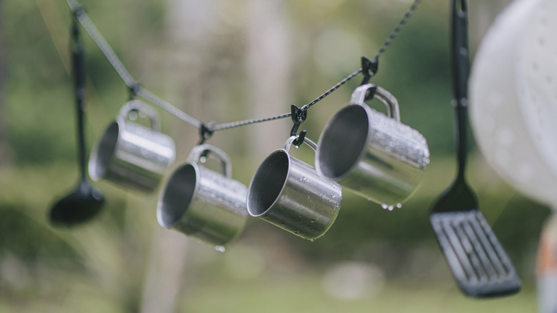 Cookware hanging on clothesline